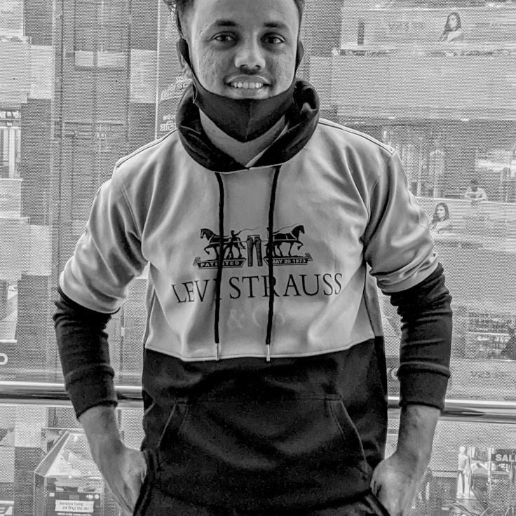 Portrait of Kai Rivera, group coordinator and fusion cooking expert